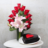Glass Vase Arrangement of 20 Red Roses and 3 Asiatic Pink Lilies- Half Kg Heart Shape Chocolate Cake